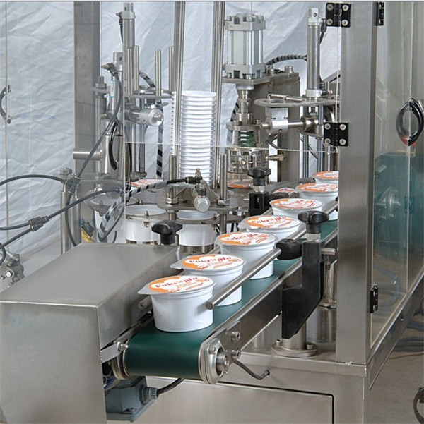 Automaattinen jäätelökupin täyttökone