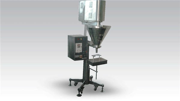 Manuaalinen suurten annosten jauheen täyttölaite