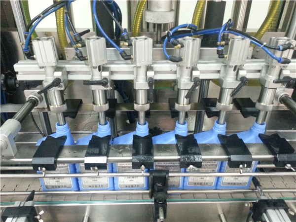 6-pää automaattinen moottoriöljytäyttö